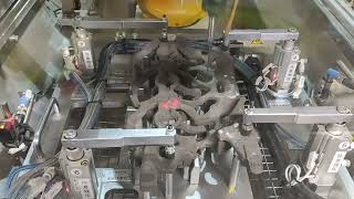 Engine casting sand core deburring & handling automation.