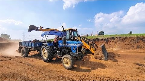 Jcb 3dx Backhoe Loader Machine Loading Red Soil In Mahindra and Swaraj Tractor | Jcb and Tractor