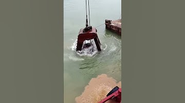 Grab dredger is performing dredging work