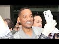 Will Smith greets a hoard of fans outside his hotel in New York City