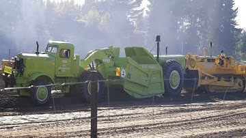 Caterpillar D8H Bulldozer pushing a 1955 Euclid 16TDT Scraper