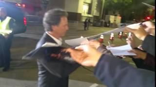 bruce greenwood signing autographs for fans in hollywood