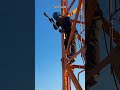 Skilled Worker Secures Steel Tower Pin #worker #process #construction #tower #engineering