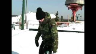 How to 50 50 a Snowboard on a Rainbow Box  How to Do Snowboard Tricks at the Park   eHow com