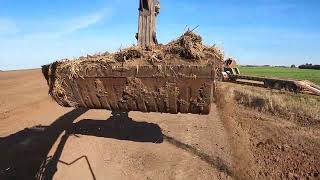 Unloading Volvo excavator off float.228