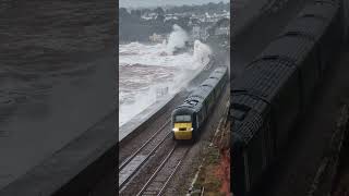 Trains with waves at Dawlish