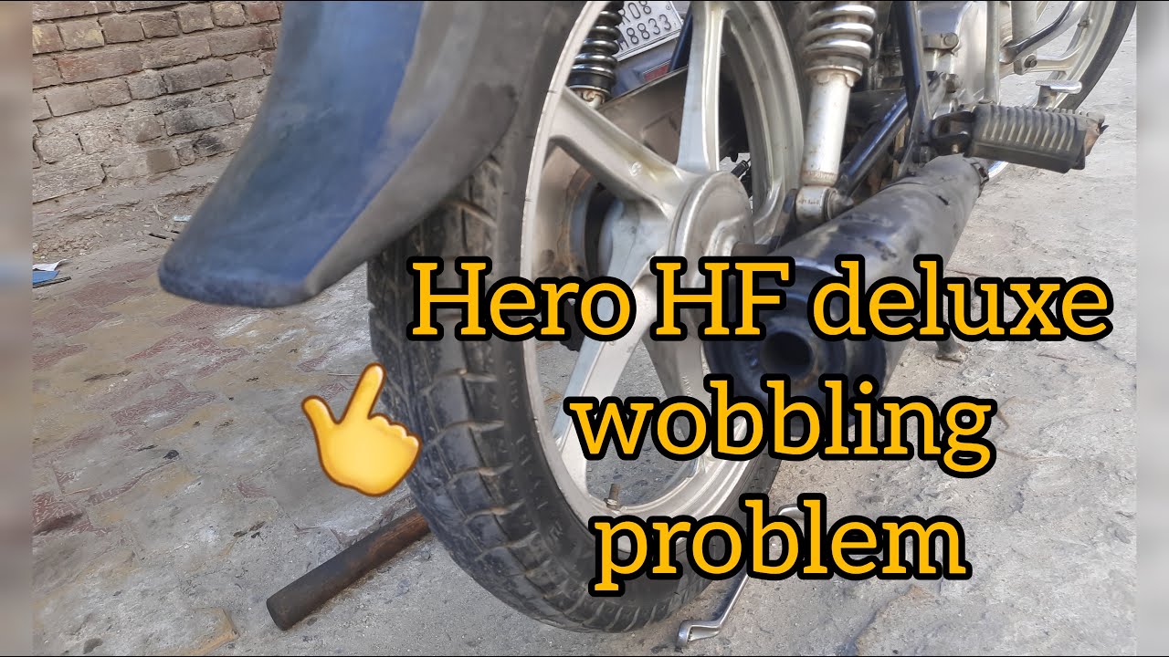 Hero HF deluxe wobbling problem bike wobbling problem shaking problem