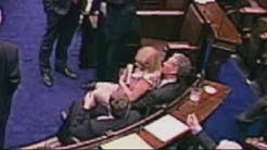 Irish MP pulls female MP onto his lap in Parliament debate