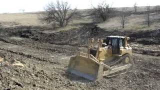 Tree removal with Caterpillar D8T Bulldozer