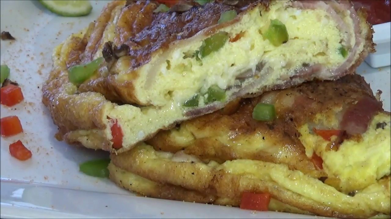 Mountain Man Bacon Wrapped Omelette in a Cast Iron Skillet Made Inside