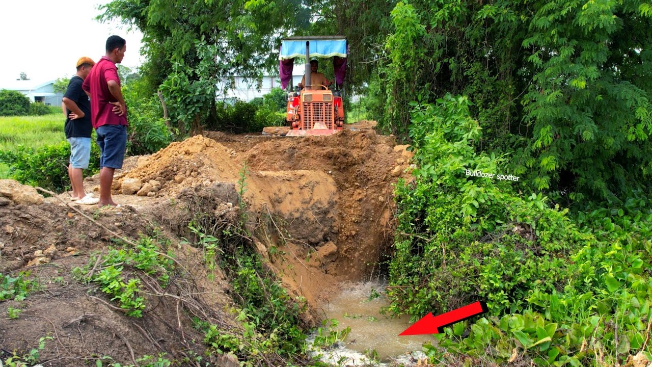 Incredible !! Landfilling repair road skiller operator Bulldozer pushing  soil into the water.