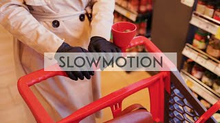 Woman wearing a glove Pushing a Cart - Cinematic Slowmotion Free Stock screenshot 4