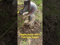 Digging holes with a post hole digger. #postholedigger