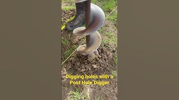 Digging holes with a post hole digger. #postholedigger