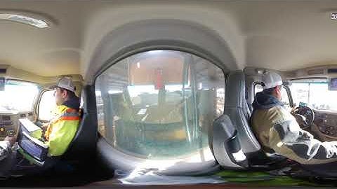 Cab View of Feeding Cattle in a Kirby LP1200 Vertical Mixer