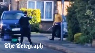 Hainault station attack: Police officers attacked with sword after vehicle hits house in London Resimi