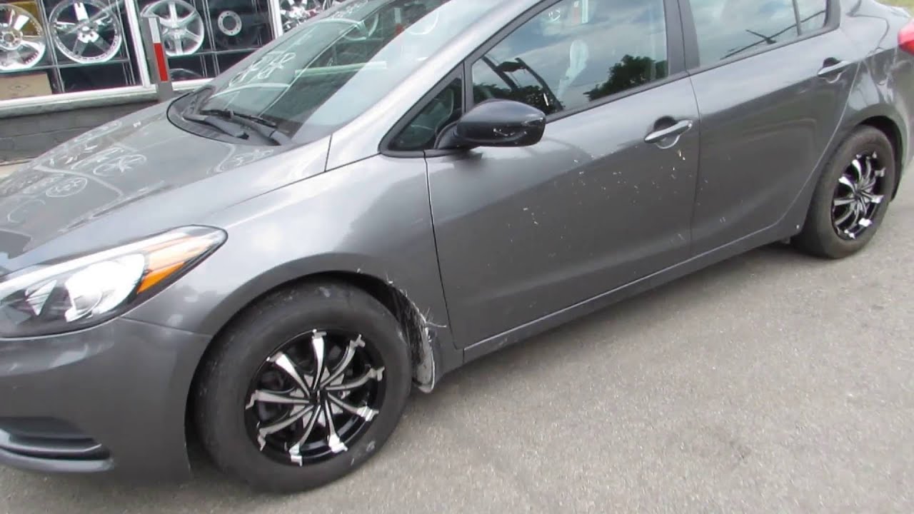 2014 KIA FORTE RIDING ON 15 INCH CUSTOM RIMS & TIRES - YouTube