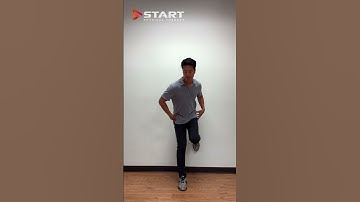 PRI standing wall supported right knee flexion with left glute med and right trunk rotation