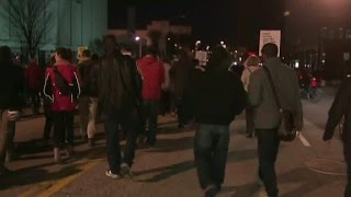Protesters march down Baltimore streets