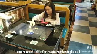 Smart touch table for restaurant order game and news