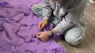 Cutting out head fabric and sewing.