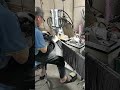 Welding process , our worker is welding part of metal corner shelf for kitchen orgainzer &amp; bathroom