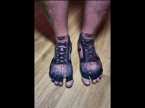 Tattoo artist gives man 'permanent shoes' 👟👟 #Inked #Tattoo #JustDoIT #TrainerTattoo