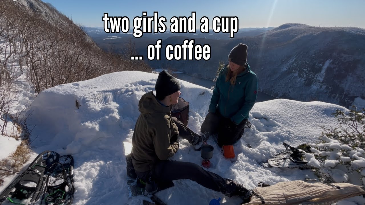 Two Girls and a Cup Of Coffee On A Snowy Outlook 