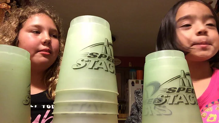 My little sister trying to do cup stacking