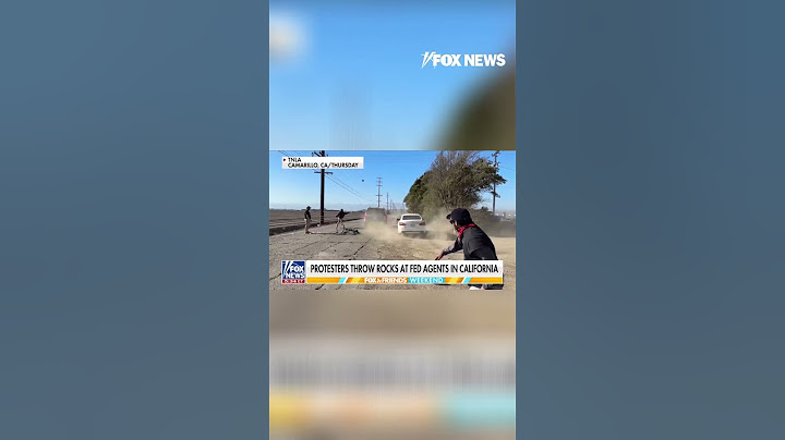 WATCH: Protesters throw rocks at ICE agents in California