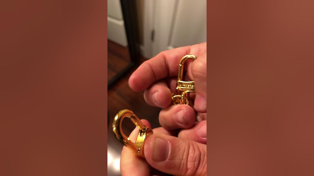 how to open key ring part of LV key ring extender
