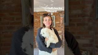 A Custom King Sized Headboard In Hollyhocks Fabric