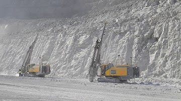 SmarTROC D65 drilling presplit holes in gold mine open pit