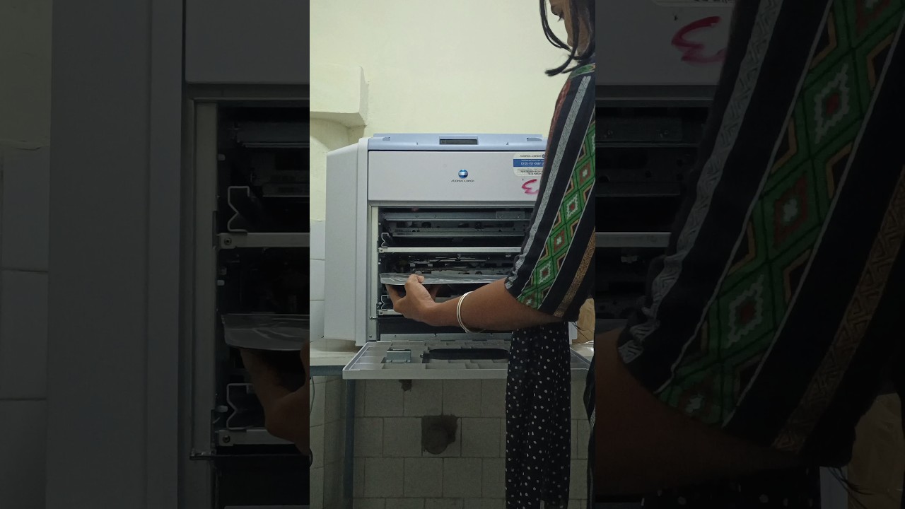 how to load xray film in konica Minolta printer ? 