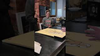 Jade and Deb choosing custom framing