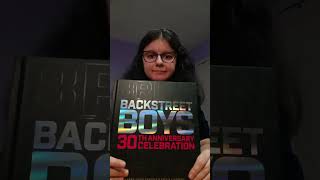 Emilia opens her book BACKSTREET BOYS: 30th ANNIVERSARY CELEBRATION for the first time!