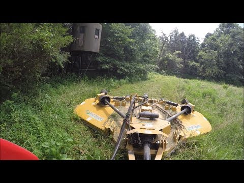 tractor-mowing-deep-trails,-obstacles-&-food-plots,-bushwhacker-md-144