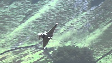 A single low level Eurofighter Typhoon in the Mach Loop