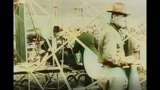 Colorized - Teddy Roosevelt flys a bi-plane in St. Louis, Mo - 1910