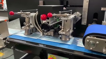 Surgical mask flow wrapping machine | Máquina de envoltura de flujo de máscara quirúrgica