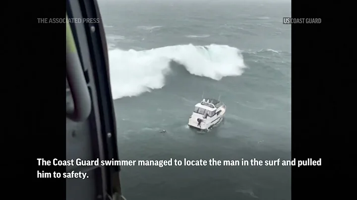 Huge wave capsizes boat as rookie U.S. Coast Guard swimmer rescues man from ocean