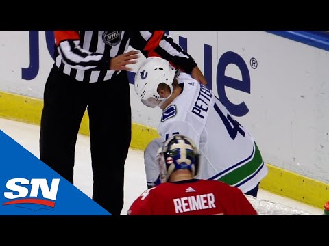 Elias Pettersson Exits Game After Getting Slammed To The Ice By Matheson