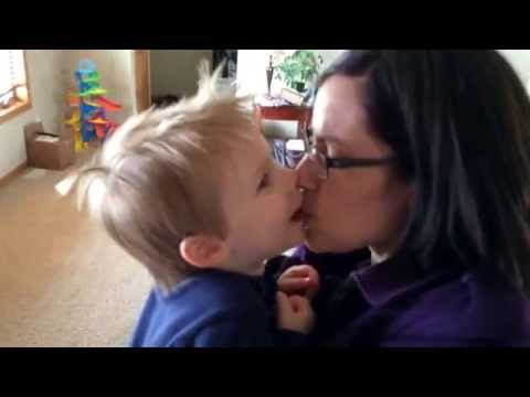 Leo (2 years) giving Mom kisses