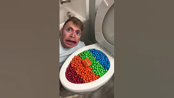 Eating Colorful Chocolate M M S Candy In Toilet Shorts 