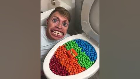 Eating Colorful Chocolate M&M