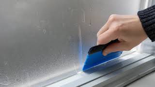 Pushing Bubbles Out From Behind Vinyl Window Film