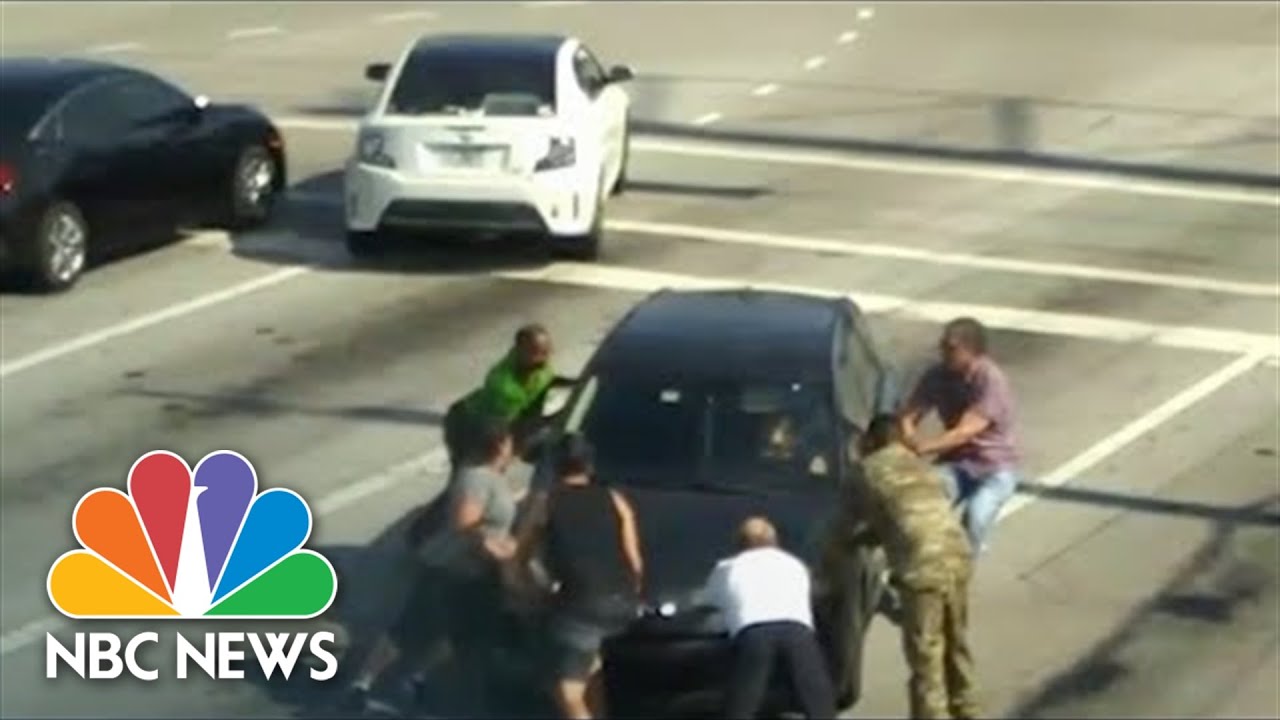 ⁣Watch: Good Samaritans Rescue Florida Woman Who Passed Out While Driving