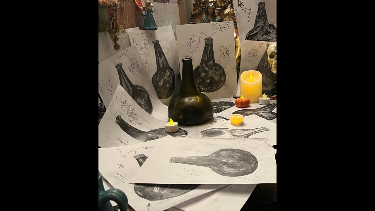 E.J. Parker is drawing the antique bottle live!