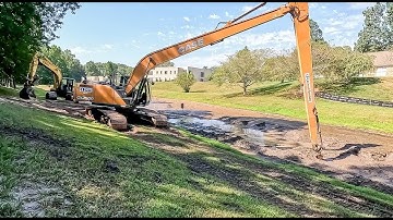 Long Reach Excavator Dredging Pond