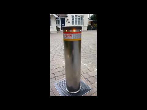 Fadini Stainless Steel automatic bollard on an opening cycle operated by remote control.